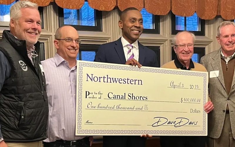 Links Capital Advisors Principal Chris Charnas and others presenting funds for The Evan's At Canal Shores